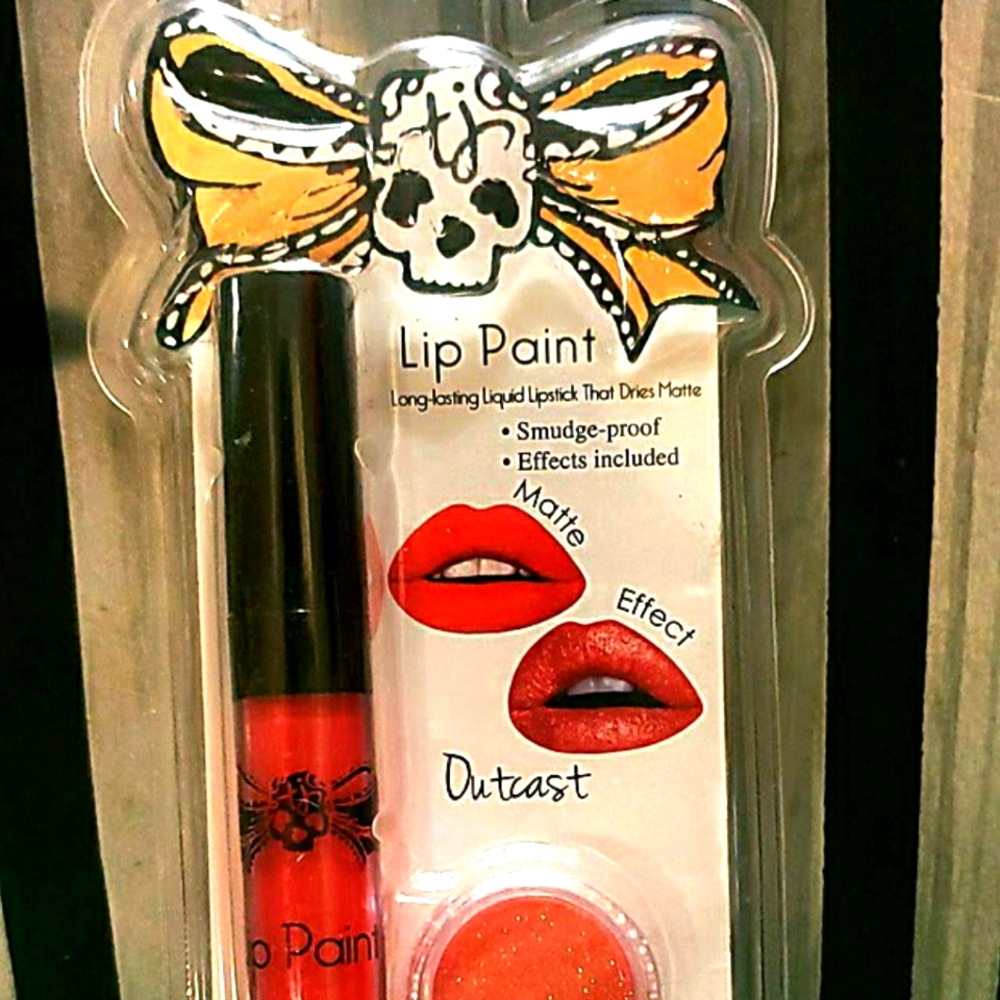 Outcast Tattoo Lip Painting